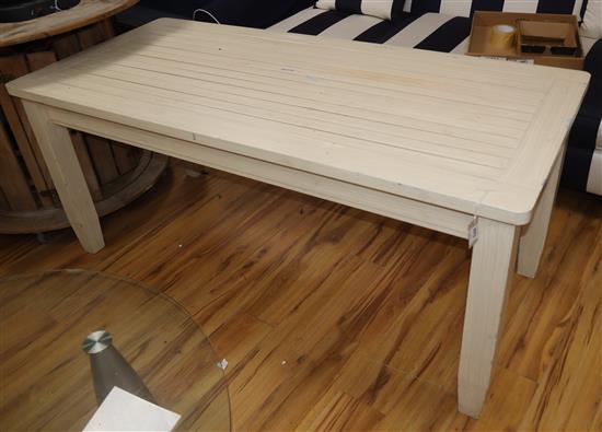 A white painted wooden garden table, with a slatted top 170 x 77cm